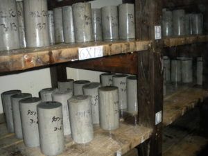 Concrete cylinders curing in one of our moist rooms